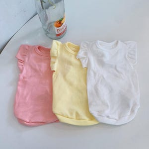 May include: A rustic wooden sign with the text "Welcome to our home" in white lettering. The sign features a distressed finish and a simple, inviting design, perfect for a front porch or entryway.