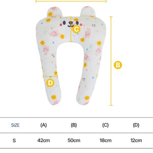 May include: A white and pink U-shaped pregnancy pillow with a sun and bear print. The pillow is available in two sizes: S (42cm x 50cm x 18cm x 12cm) and M (55cm x 57cm x 20cm x 15cm).