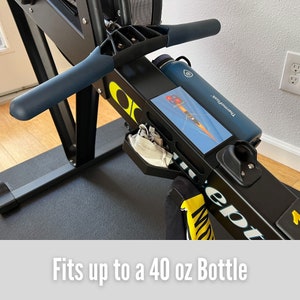 Water bottle / towel / earphone holder compatible with Concept2® Rower / RowErg® with a spot for recording time or placing a picture