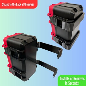 May include: Two black and red storage boxes with mounting brackets. The boxes have a rectangular shape with a red top and bottom. The text "Straps to the back of the rower" and "Installs or Removes in Seconds" are visible.