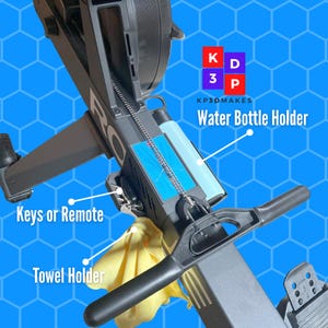 Bottle & towel holder for Rogue® Echo Rower—keeps essentials close for a cleaner, more convenient workout. With a spot for recording times.