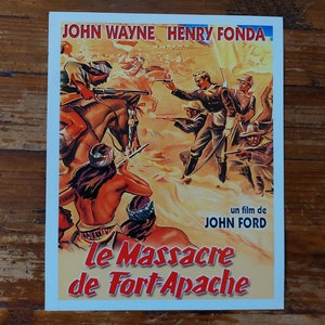 May include: A vintage movie poster for the film "Le Massacre de Fort Apache" starring John Wayne and Henry Fonda. The poster features a dramatic scene of a battle between soldiers and Native Americans. The text "un film de JOHN FORD" is also visible.