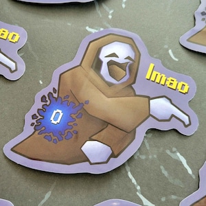 May include: A set of three ceramic mugs with a speckled, matte finish. The mugs are in shades of cream, light gray, and dark gray. Each mug has a simple, minimalist design, perfect for coffee or tea.