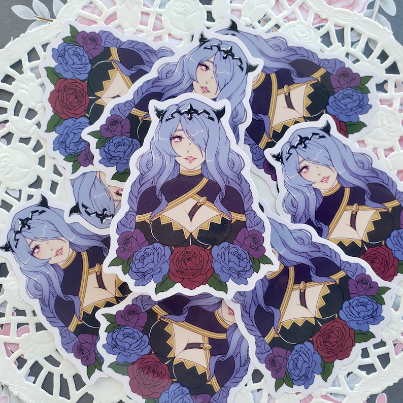 May include: A set of five stickers featuring a purple-haired anime character with horns and a black and gold outfit. The character is surrounded by flowers in shades of blue, purple, and red.