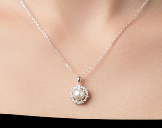 Elegant Pearl Pendant Necklace: Cubic Zirconia Halo, Silver Tone Chain - DUSKGRAND