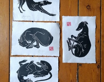 Set of four hand made longdog linocut prints. (Each A4 size) Send a message with your order for a different selection.