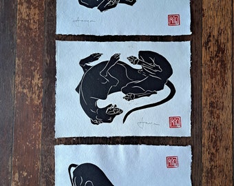 Set of my three 'landscape' hand made longdog linocut prints. Each A4 size.
