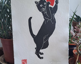 Black cat toying with heart. A3 (16.5" x 11.5") Handmade linocut print in black and red. Purrrrfect gift for cat lovers.