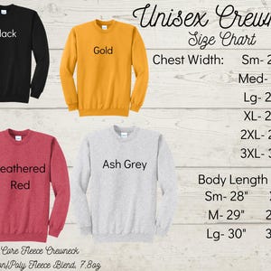 May include: Four crewneck sweatshirts in different colors: black, gold, heather red, and ash grey. The image includes a size chart with chest width and body length measurements in inches.
