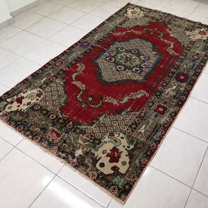 Red Turkish rug 5.2 x 9.3 ft Unique floral rug Red rug for living room Handmade wool rug Well worn Turkish rug Red vintage rug Old decor rug