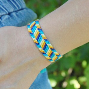 Macrame Friendship Bracelet: Blue, Yellow, Orange Woven Boho Wristband