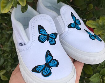 white vans with butterflies