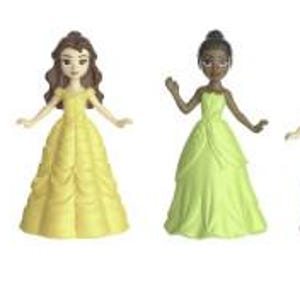 May include: Six miniature princess figurines. Each doll is dressed in a colorful gown. The dolls have different skin tones and hair colors, including black, blonde, brown, and red. The dresses are in shades of orange, blue, yellow, green, and pink.