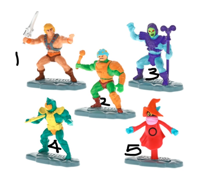 May include: Five Masters of the Universe action figures, including He-Man, Skeletor, Man-At-Arms, Beast Man, and Evil-Lyn. Each figure is posed on a separate base with a number.