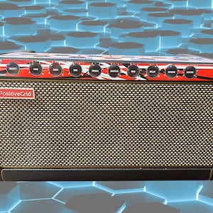 May include: Black and red electric guitar amplifier with a black speaker grille and a gold trim. The amplifier has a variety of knobs and buttons, including "Gain", "Bass", "Mid", "Treble", "Master", "Boost", "Delay", "Reverb", and "Output". The amplifier has a "PositiveGrid" logo on the front.