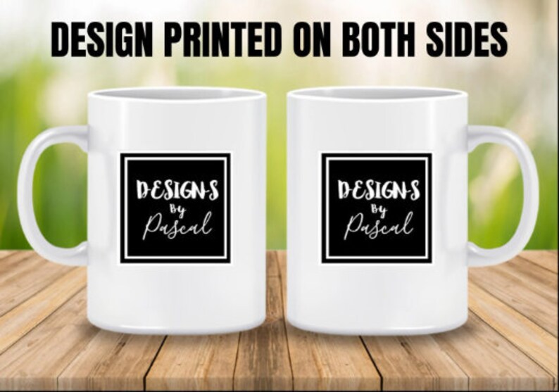 May include: Two white ceramic mugs with black square designs that say "Designs by Pascal" on both sides. The mugs are printed on both sides.