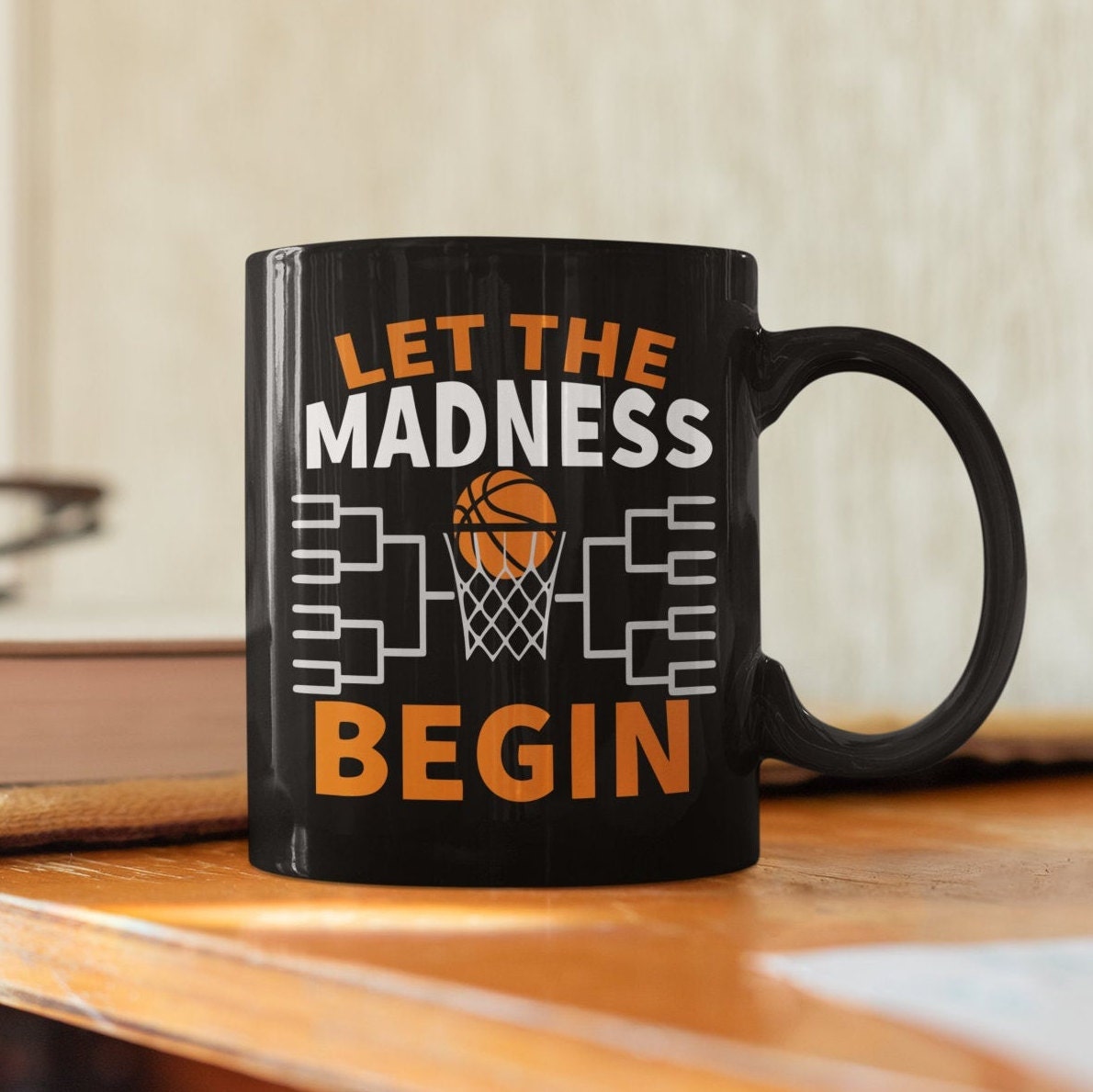 Discover Let the Madness Begin Mug