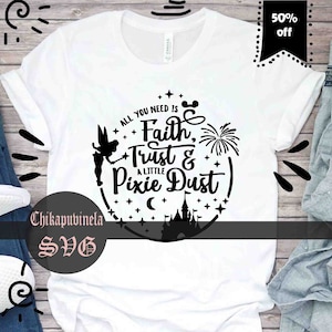 May include: A white t-shirt with a black graphic design featuring Tinkerbell, fireworks, a castle, and the text "All you need is Faith, Trust & a little Pixie Dust".