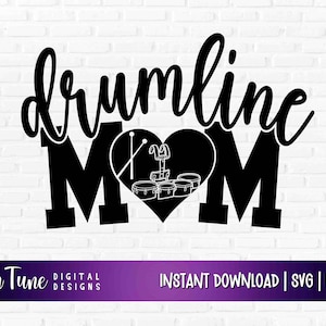 May include: Black and white graphic design with the text "drumline mom" in a heart shape with a drum set inside. The text "In Tune Digital Designs" is at the bottom left and "Instant Download | SVG | PNG" is at the bottom right.
