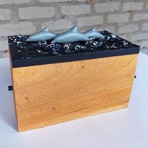 La familia de los delfines - Autómatas de madera hechos a mano