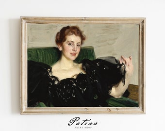 May include: A painting of a woman in a black dress with a green background. The woman is sitting in a chair and has her hand raised. The painting is framed in a light wood frame.