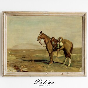 May include: A framed painting depicting a brown horse standing in a field. The horse is wearing a saddle and has a blanket on its back. The background is a hazy landscape with a mountain range in the distance.