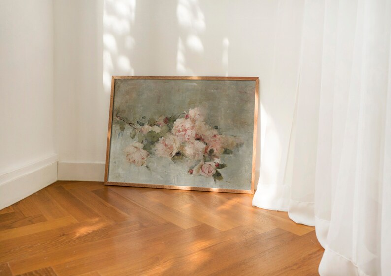 May include: A framed painting of a bouquet of pink roses in a vintage style. The painting is set against a light green background and has a wooden frame.