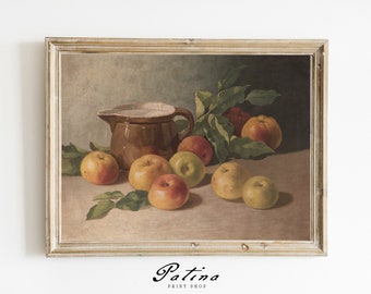 May include: A framed painting of a still life with a brown pitcher and apples. The apples are red, green, and yellow. The painting is set against a light brown background.