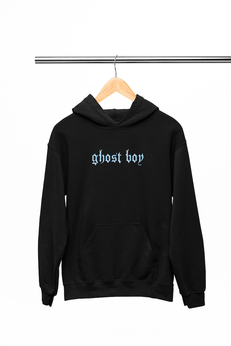 May include: Black hooded sweatshirt with a light blue embroidered design that says "ghost boy" in a gothic font.