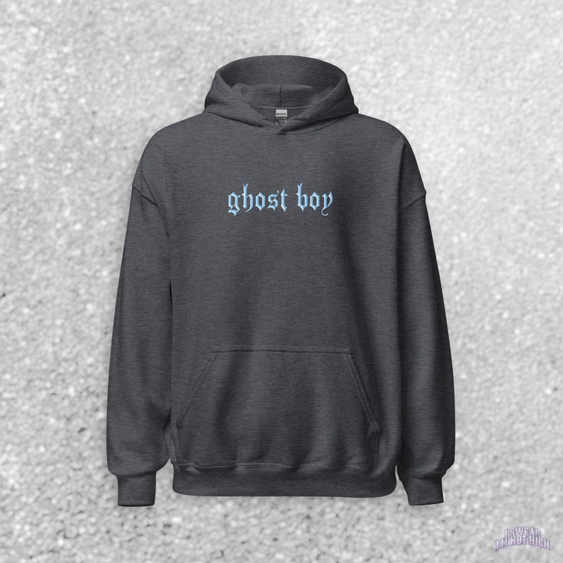 May include: A dark gray hooded sweatshirt with the text "ghost boy" embroidered in light blue on the front.