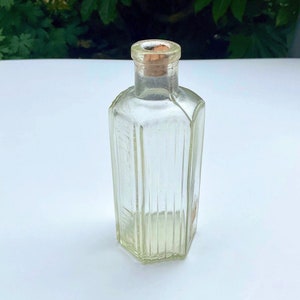Early 20th Century Clear Hexagonal 5oz Poison Bottle with Not to be Taken down one side and two Ribbed sides Chemist Apothecary bottle