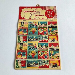 Loja de selos vintage de felicitações de Natal exibe novo estoque antigo por volta de 1940