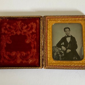 19th Century Ambrotype Photograph of a Young Gentleman with a Glass Eye in a Double Hook Latched Leather Case