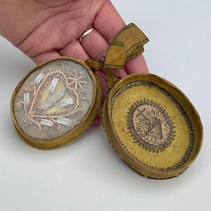 18th Century Travel Embroidery Reliquary, Multiple Holy Relics, Sacred Heart and The Virgin Mary Holding Baby Jesus Sculpture Circa 1790’s