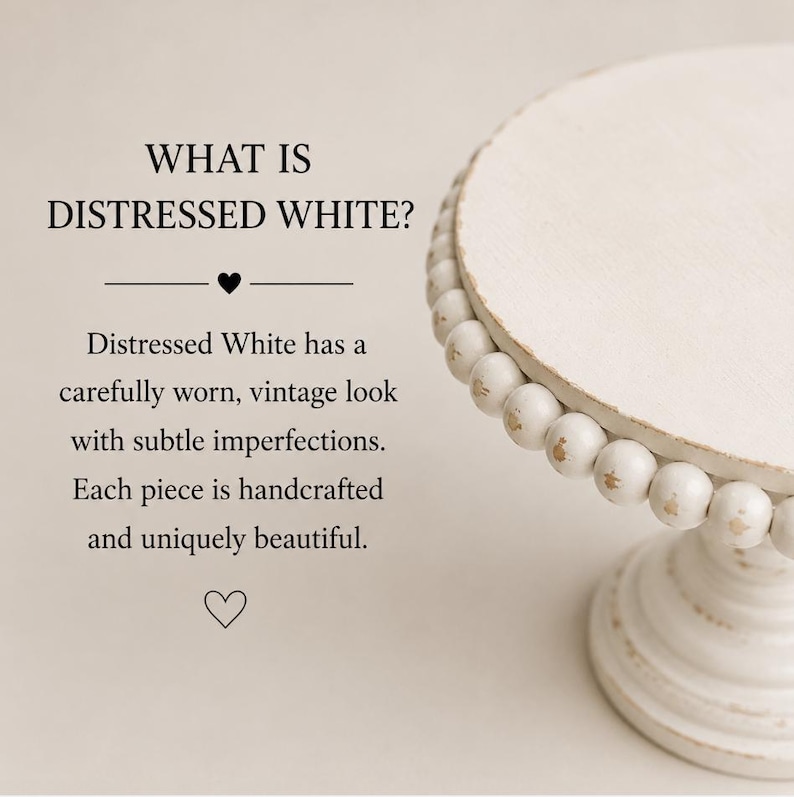 May include: A white pedestal cake stand with a distressed finish and a beaded rim. The text reads: WHAT IS DISTRESSED WHITE? Distressed White has a carefully worn, vintage look with subtle imperfections. Each piece is handcrafted and uniquely beautiful.