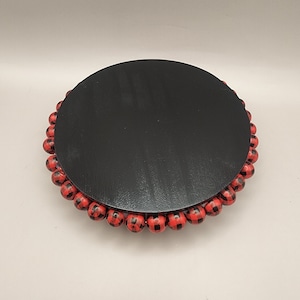 Farmhouse Wood Riser: 5&quot; Round Top in Black with Red Buffalo Print Beads