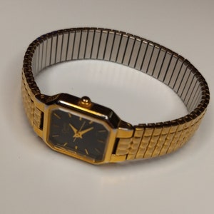 Vintage Caravelle by Bulova Watch Gold Tone Used Needs Battery Slight Wear
