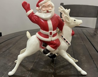 Figura de celuloide vintage Rosbro Irwin de plástico "Hi Ho Santa" con reno montado, Pat 169824, década de 1950
