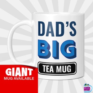 May include: White ceramic mug with a blue and black design. The mug says "Dad's Big Tea Mug".