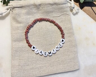 Bracelet in chosen colour with two hearts -personalised seed bead name/word