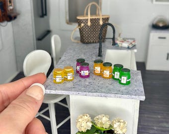 Miniature dollhouse labeled honey or jam jars, dollhouse canned food