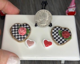 Miniature dollhouse Valentine’s Day decorations and treats, mini hearts and cookies