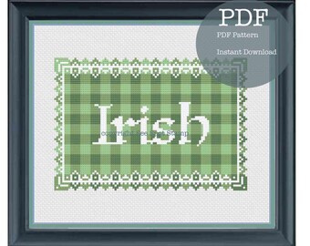 May include: Framed cross-stitch pattern with the word "Irish" in white, set against a green plaid background. The design is framed in a black frame with a light green border. The text "PDF PDF Pattern Instant Download" is in the upper right corner.