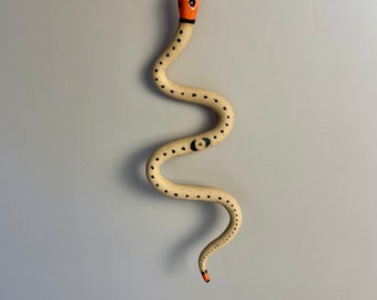 Handmade ceramic orange and black Snake Talisman