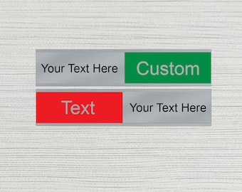 May include: Two silver nameplates with text. The top plate is green and says "Custom". The bottom plate is red and says "Text". Both plates have the text "Your Text Here" on them.