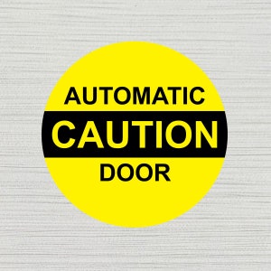 Adesivo de vinil para porta automática com cuidado