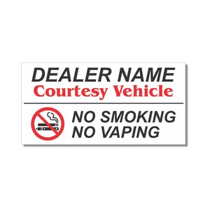 May include: White sign with black text that reads "DEALER NAME Courtesy Vehicle" and a red circle with a diagonal line through it and a black image of a cigarette with smoke coming from it. Below the circle is black text that reads "NO SMOKING NO VAPING".