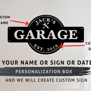May include: Black and white metal sign with the text "Jack's Garage" and "Est. 2019".  The sign is customizable with a name and date.