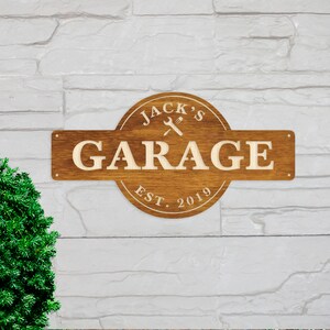 May include: A wooden sign with the text "Jack's Garage Est. 2019" and a wrench and screwdriver graphic.