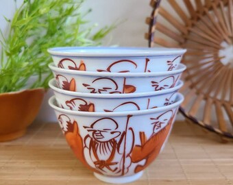 Vintage saki cups beautiful orange painted figures with blue trim set of 4 porcelain maked on bottom Asian serving rice dish Chinese decor